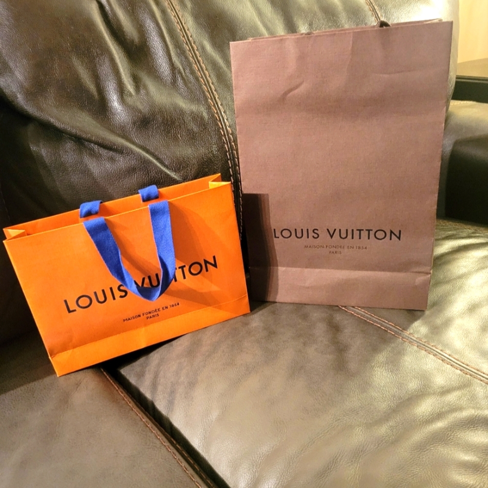 2 Louis Vuitton Bags.